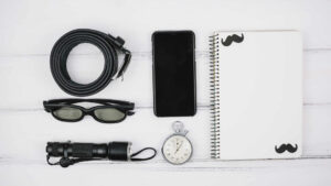 set-smartphone-near-notebook-male-accessories